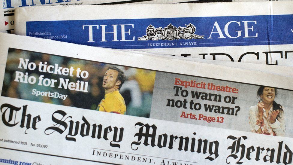 This photo illustration show newspaper front pages of media group Fairfax in Sydney on May 7, 2014.