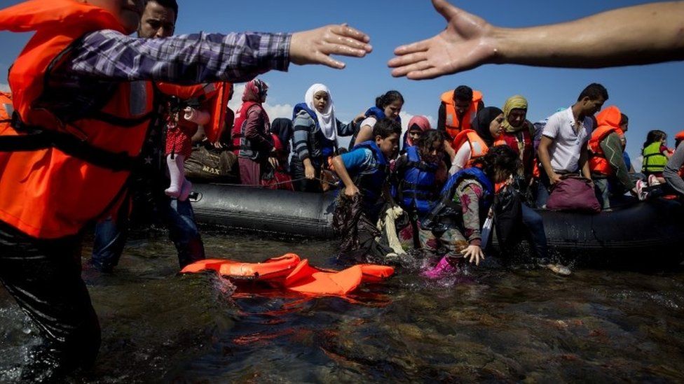 Refugees landing in Greece