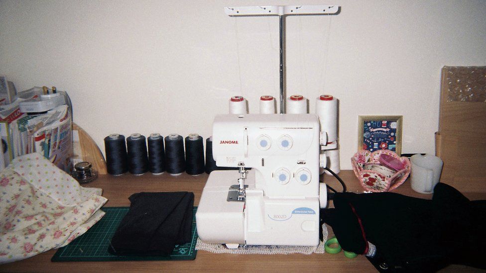 A sewing machine and reels of thread