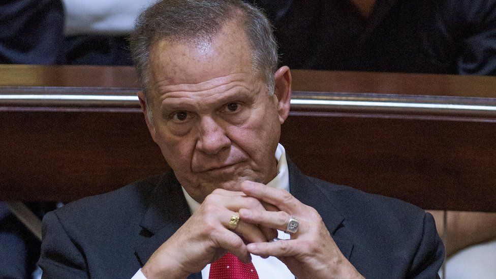 Embattled Alabama Chief Justice Roy Moore listens to closing arguments during his ethics trial before the Alabama Court of the Judiciary on 28 September