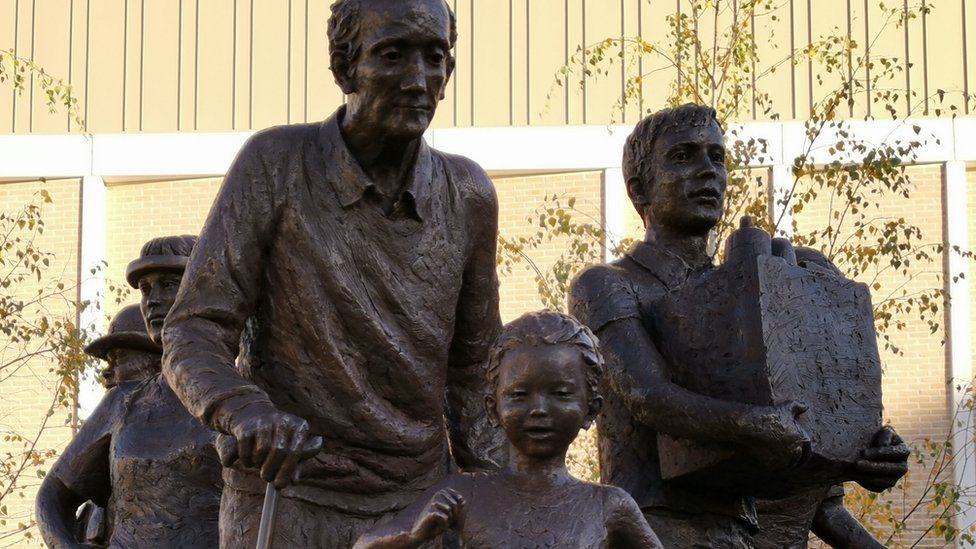 The sculpture depicts those affected by the pandemic