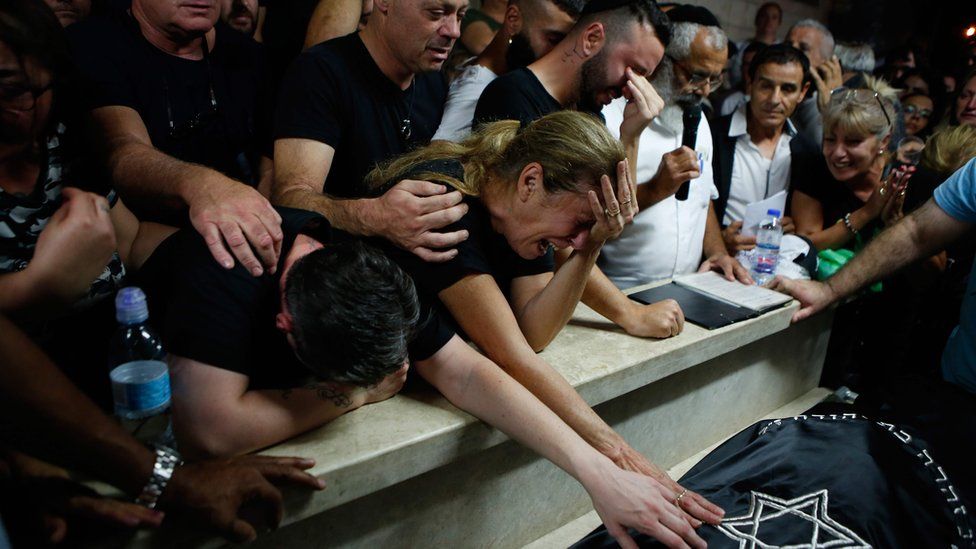 Mourners at the funeral of Kim Levengrond Yehezkel, an Israeli woman who was shot at the Barkan Industrial Zone in the occupied West Bank on 7 October 2018