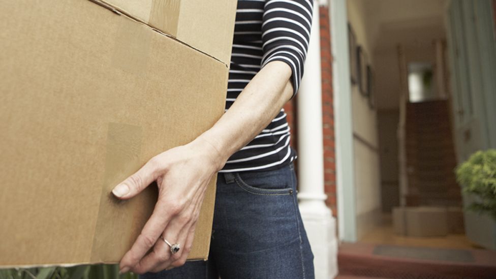 Woman moving house