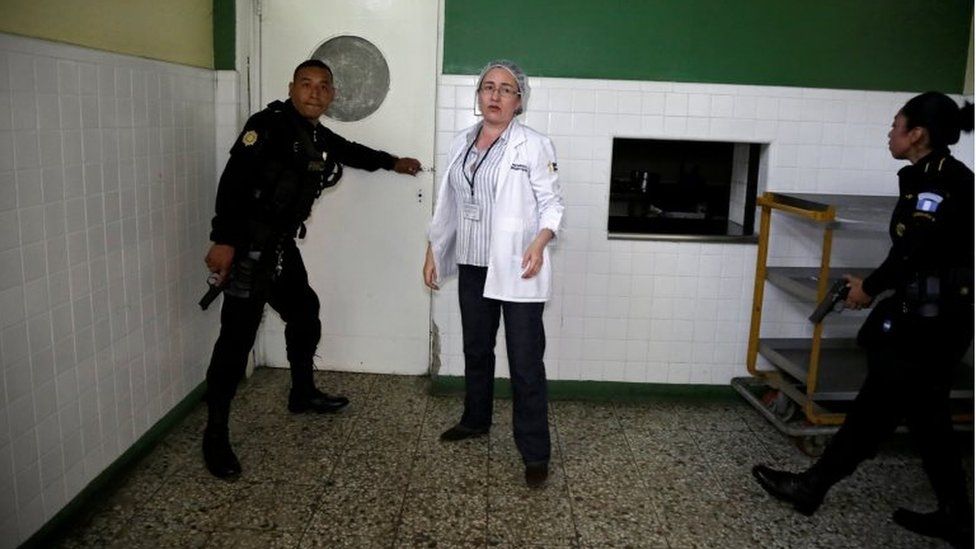 Police officers inside the Roosevelt Hospital in Guatemala City, Guatemala August 16, 2017.