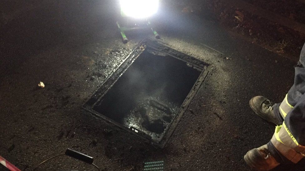Burnt open manhole