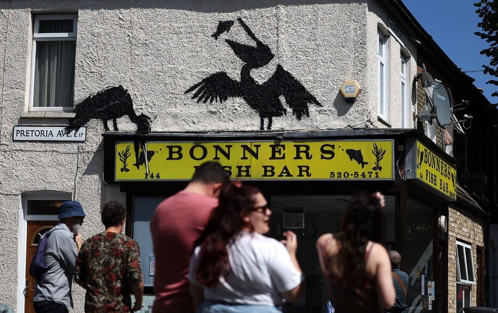 Banksy's pelicans, above Bonners fish bar 