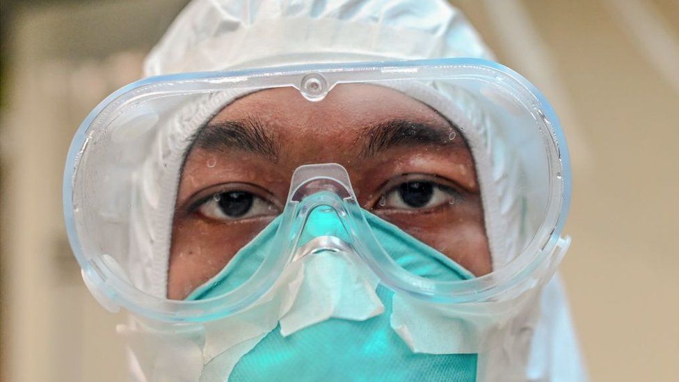 File photo of a volunteers at the Covid Centre in Yangon