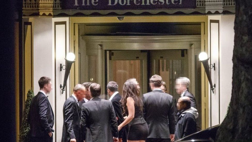 Guests of the dinner outside the Dorchester