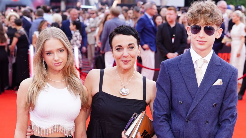 Grace Freeman, Amanda Abbington and Joe Freeman arrive at the UK premiere of Mission: Impossible - Dead Reckoning Part One at Odeon Leicester Square in London. Picture date: Thursday June 22, 2023