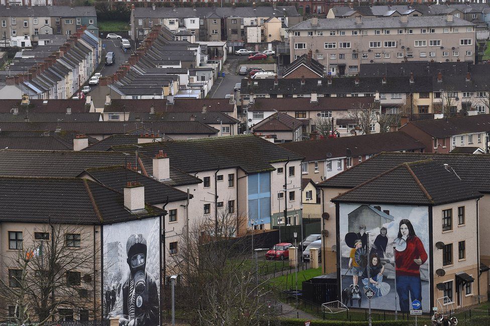 Murals on the gable walls of flats and houses in the Bogside in Derry