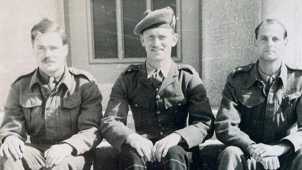 Major John Errington (left), during his time as a prisoner of war in 1942