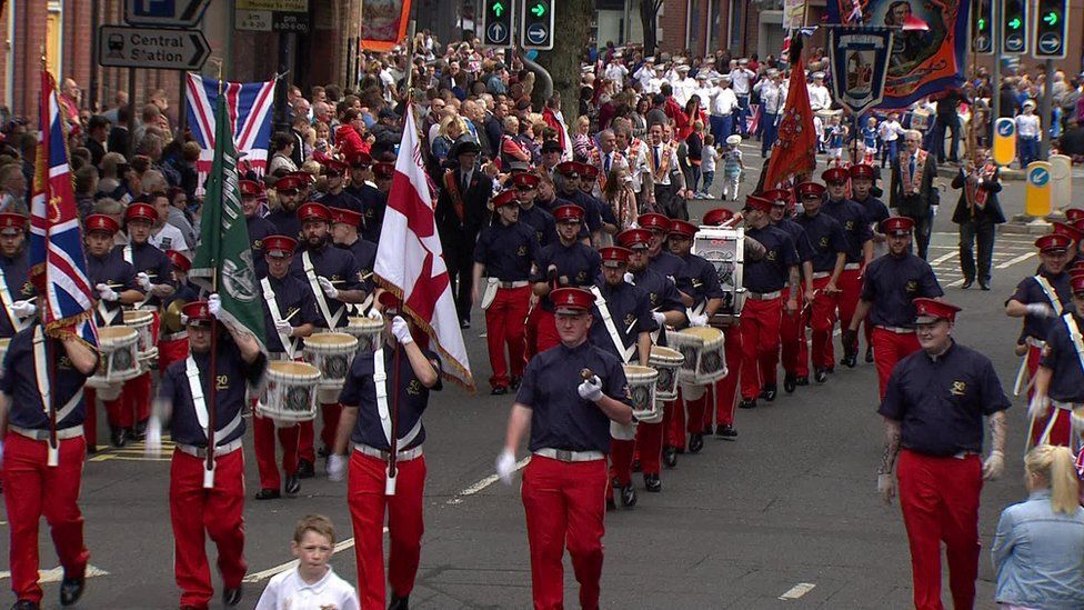 The main Belfast parade, traditionally the longest 12 July march, began at 10:00 BST