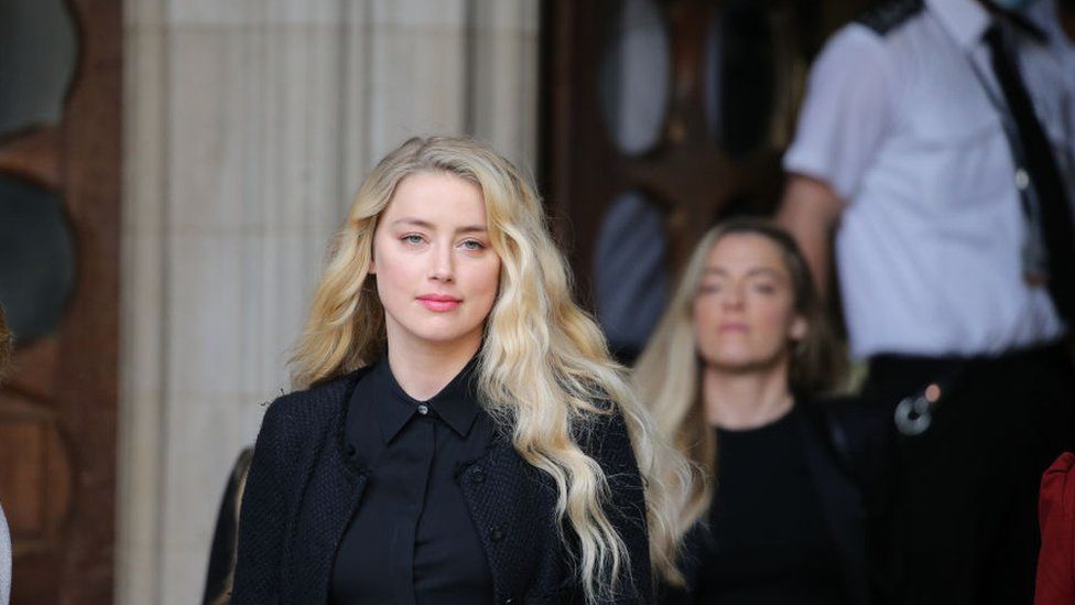 American actress Amber Heard makes a statement outside the Royal Courts of Justice in London, England on July 28, 2020