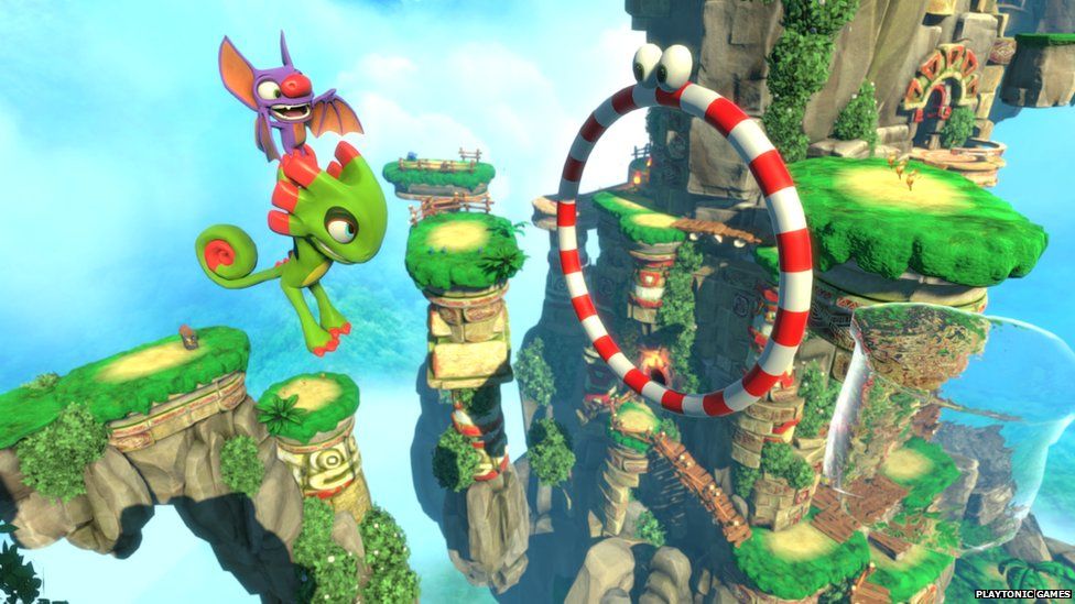 Yooka-Leylee. A dragon flies through a hoop on this platform game