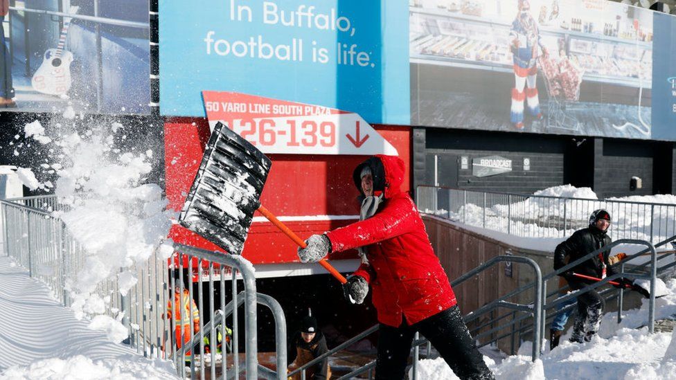 June Jarnot shovels snow before the AFC Wild Card playoff game between the Buffalo Bills and Pittsburgh Steelers at Highmark Stadium on January 15, 2024 in Buffalo, New York.