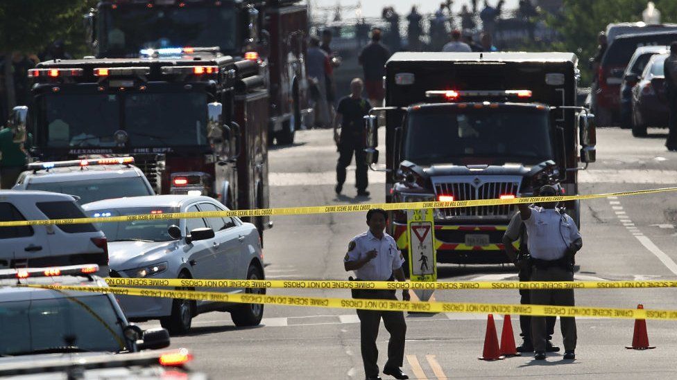 Investigators and emergency personnel gather in Alexandria, Virginia.