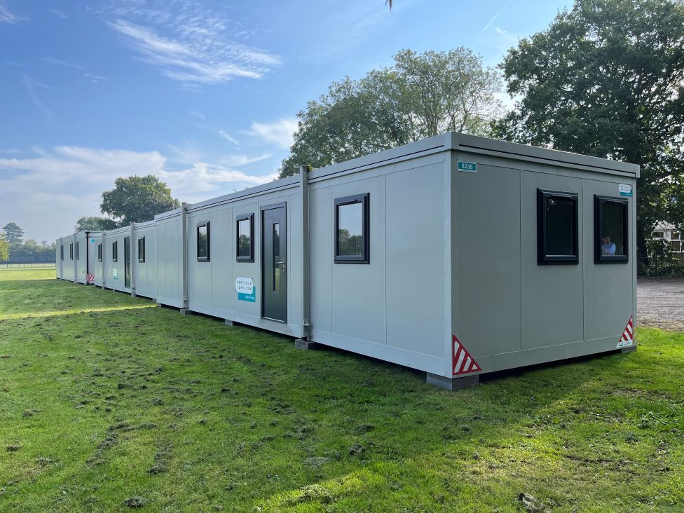 A temporary classroom that looks like a portacabin has been put in the school grounds.