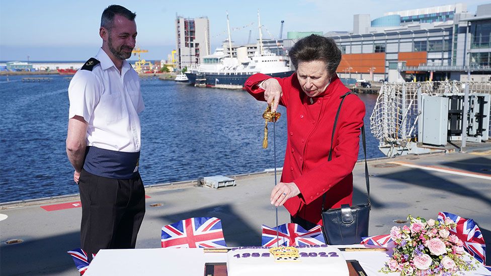 The Princess Royal uses the Captain's Sword by to cut a commemorative Jubilee cake during her visit to HMS Albion in Edinburgh, as members of the Royal Family visit the nations of the UK to celebrate Queen Elizabeth II's Platinum Jubilee.