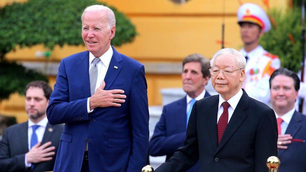 Vietnamese General Secretary of the Communist Party Nguyen Phu Trong (R) and US President Joe Biden (L) review the guard of honor at the Presidential Palace in Hanoi, Vietnam, 10 September 2023
