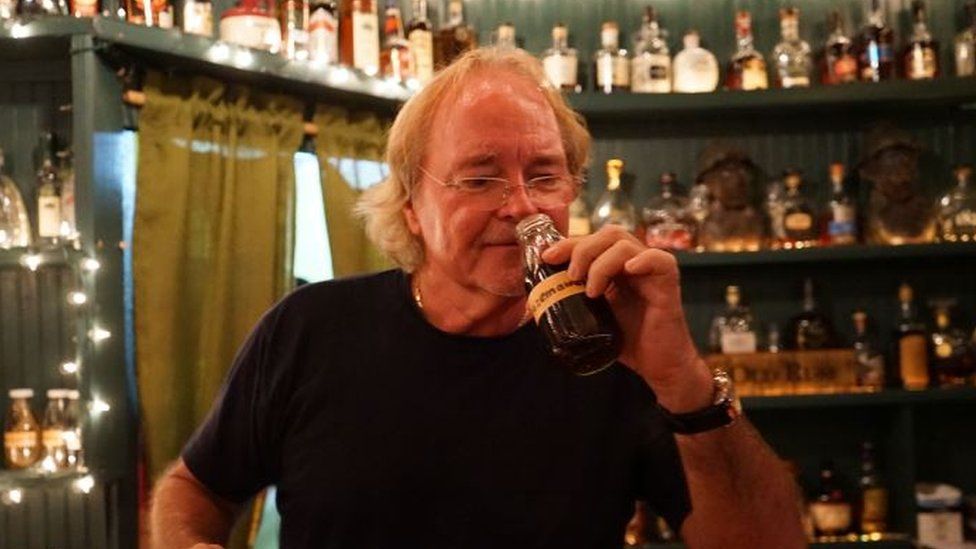 Bert Kirchner runs one of the island's last remaining traditional rum shops