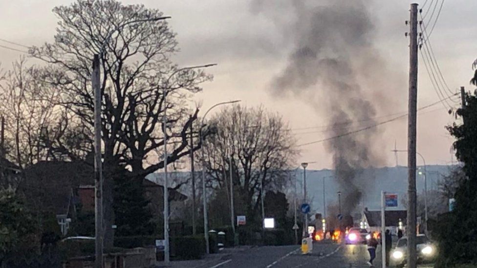 Newtownabbey: Police attacked with petrol bombs and fireworks - BBC News