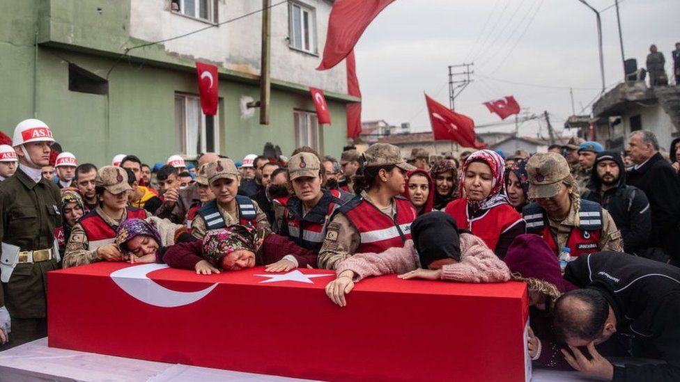 Image shows mourners of a killed Turkish solider