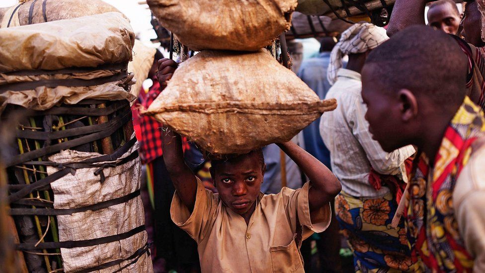 A child selling charcoal in Kabezi, Burundi (photo from 24 June 2015)