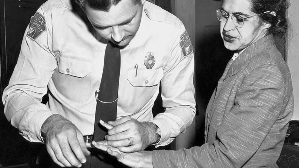 Rosa Parks being fingerprinted after not giving her seat up on a bus