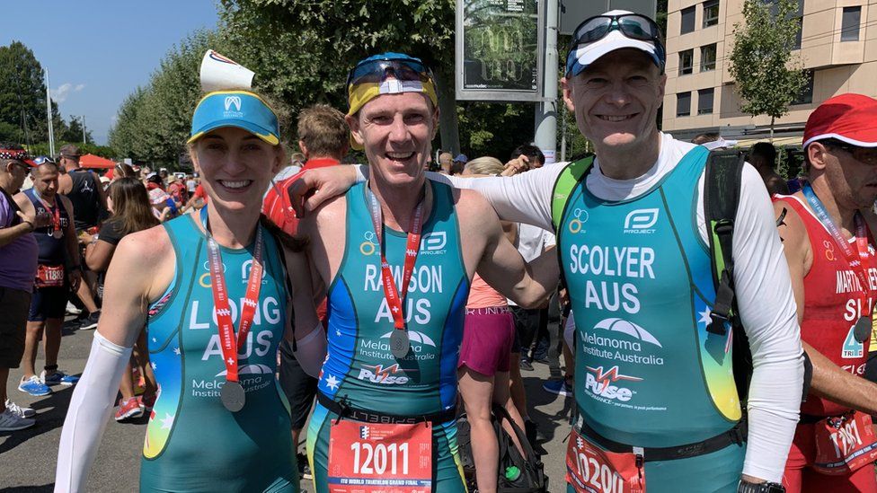 Georgina Long (left) and Richard Scolyer (right) at a triathlon event