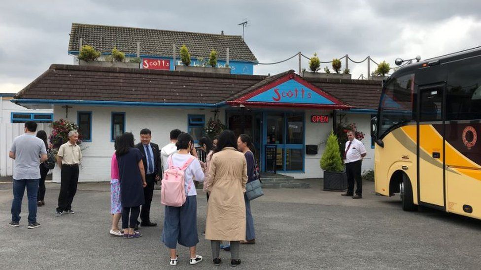 Chinese visitors to Scotts Fish and Chips