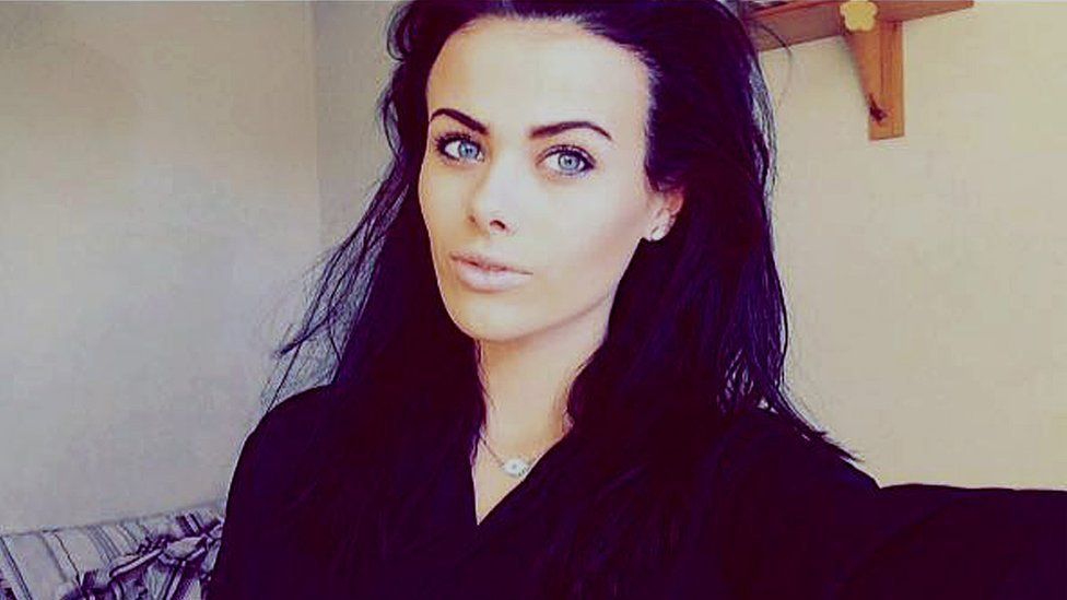 India Chipchase with long dark hair 