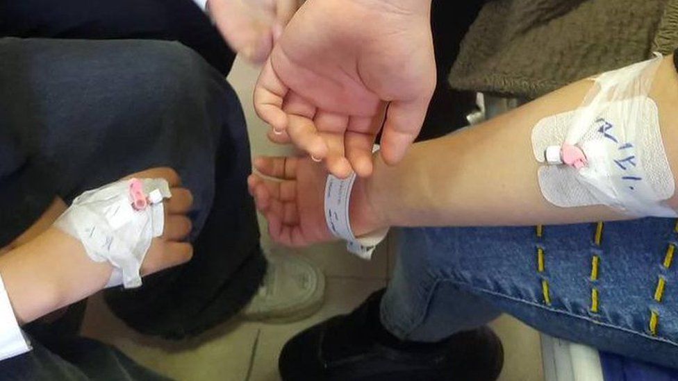 Twitter screnshot of photos online of pupils' arms after blood samples were taken