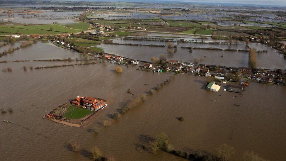 Moorland, Somerset in 2014, with houses and fields under floodwater