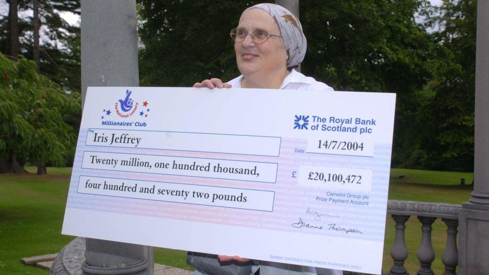 Iris Jeffrey with her lottery cheque