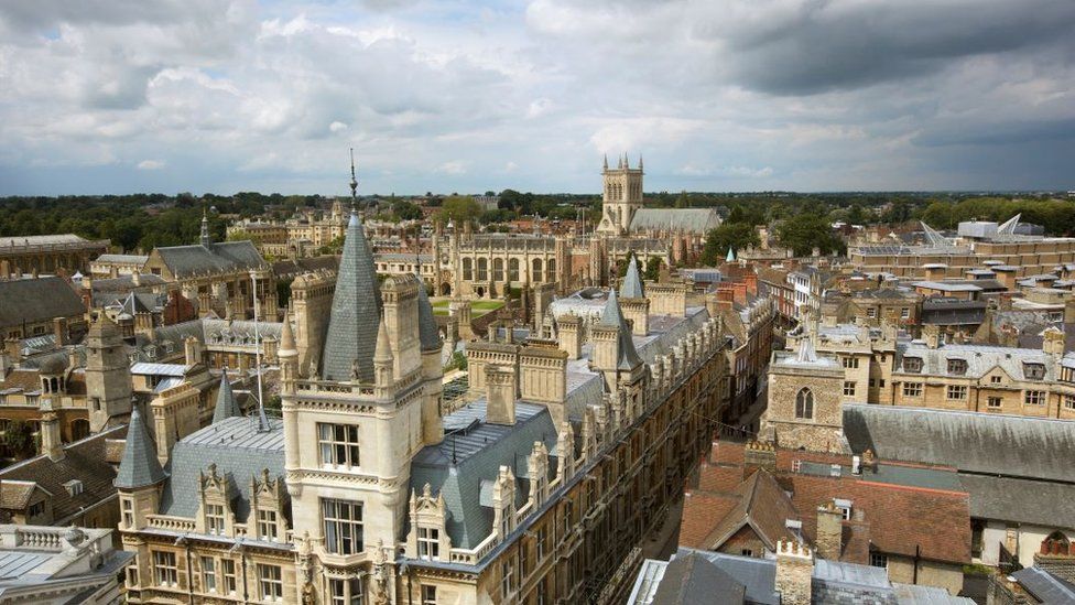 Elevated view of the skyline and spires of Cambridge, Trinity College and the Chapel of St John's college