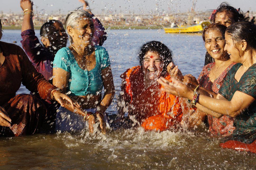 A group of women captured at the Holy Sangam in Devprayag