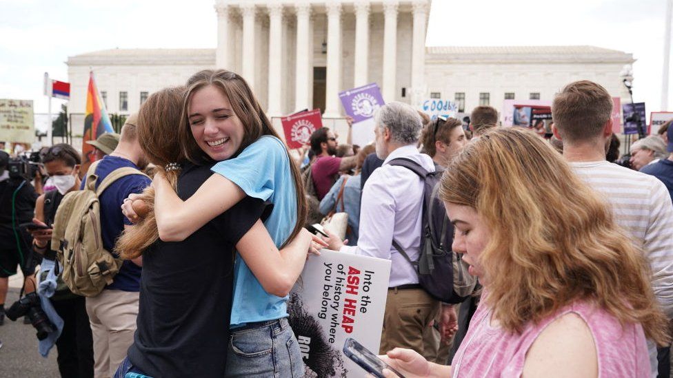 Pro life supporters hug after Supreme Court ruling