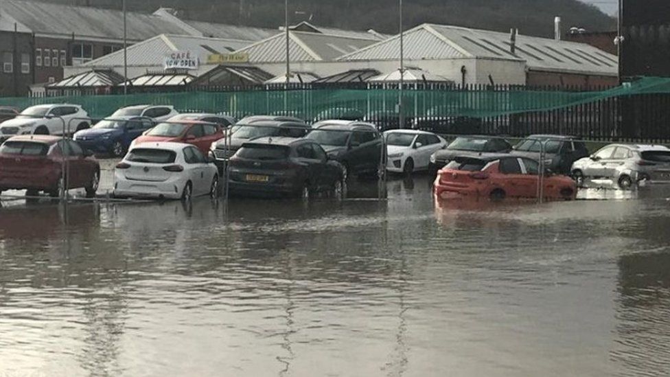 Flooded cars at Hutchings Motor Group in Pontypridd