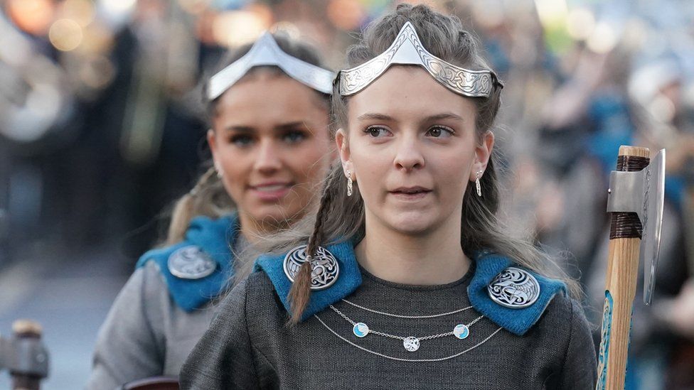 Jen Moar the daughter of Guizer Jarl Richard taking part in Up Helly Aa in Lerwick