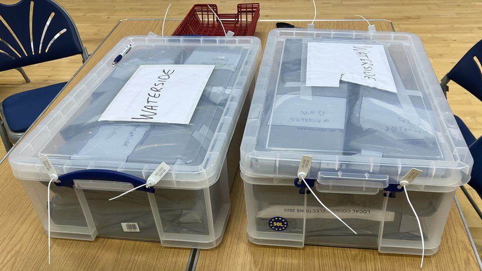 boxes of election papers at watersdie recount in derry