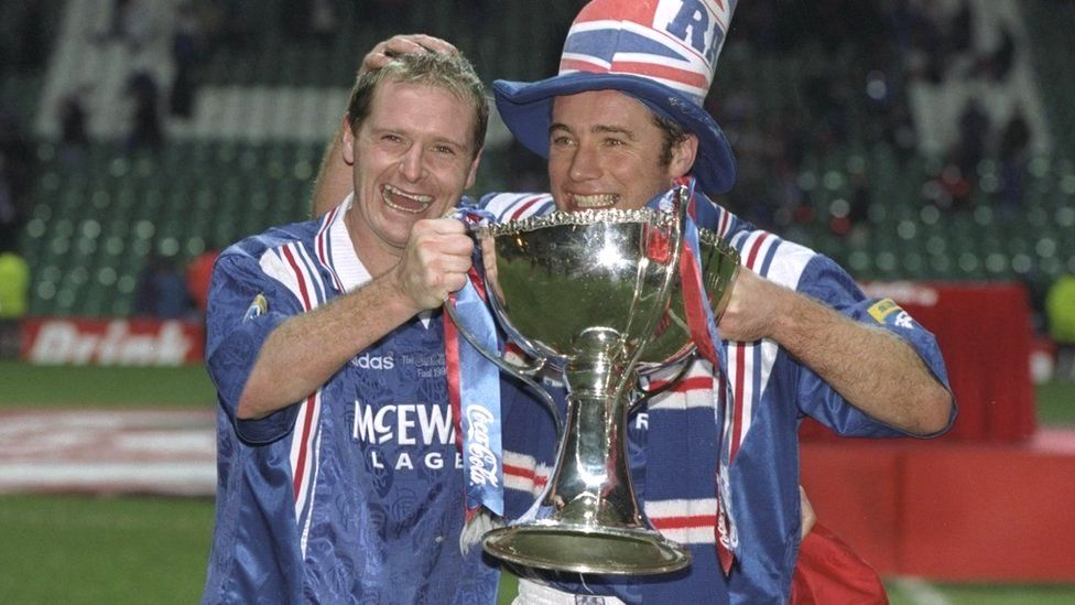 Paul Gascoigne (left) and teammate Ally McCoist pose with the trophy after the Scottish Coca Cola cup