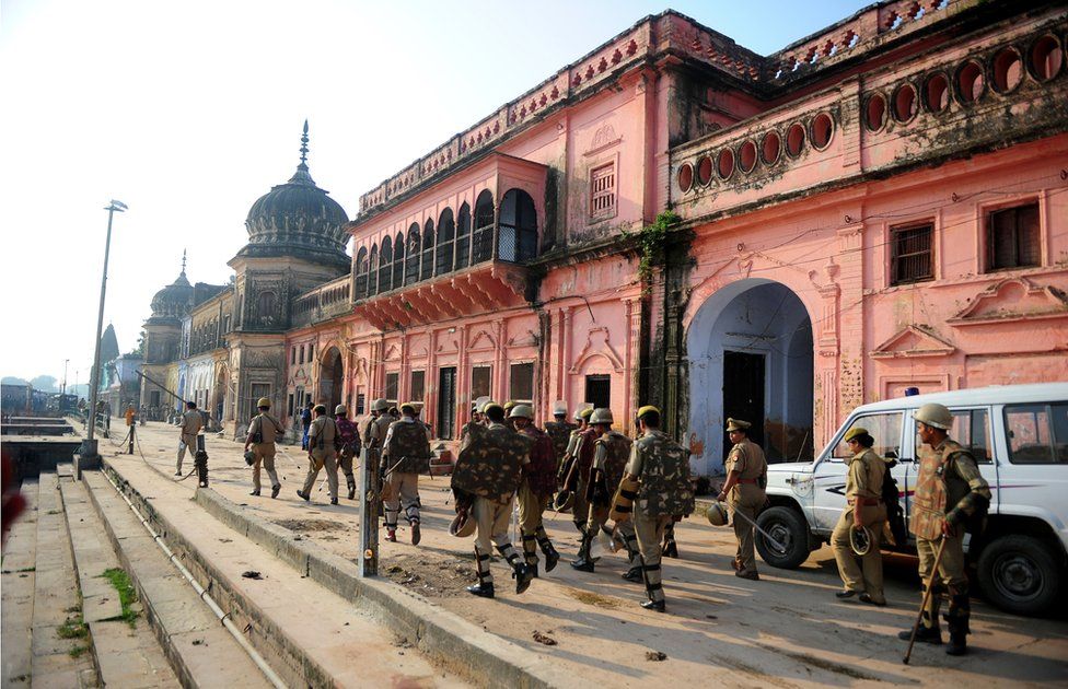 Indian police on patrol near a temple in Ayodhya in 2013