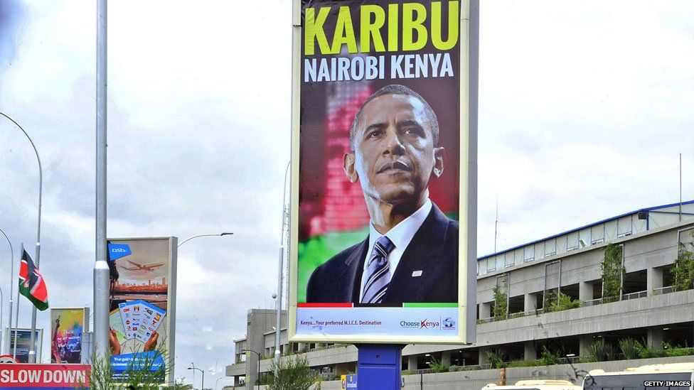 A banner bearing the likeness of the President of the United States, Barack Obama and bearing a 'welcome' message hangs over the arrival lounge of the Kenya's Jomo Kenyatta airport in Nairobi on July 23, 2015