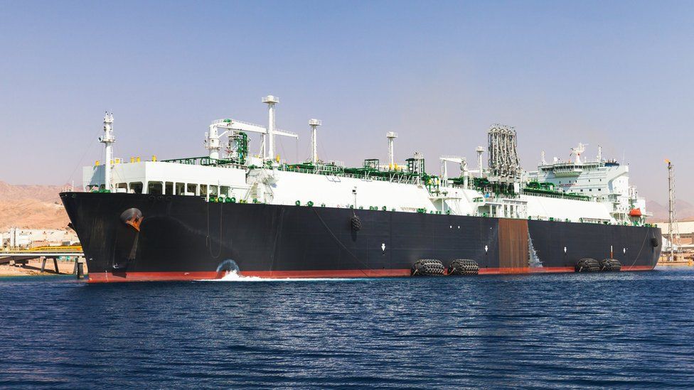 Loading of huge oil tanker in a port in Jordan