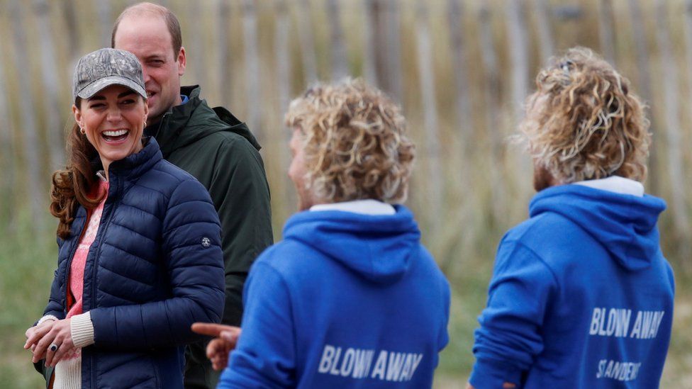 Prince William and Catherine speak to members of Fife Young Carers at the beach in St Andrews