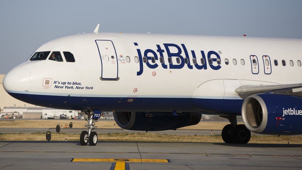 A JetBlue Airways Corp. Airbus Group SE A320 aircraft taxis to the gate on the tarmac at Long Beach Airport in Long Beach, California, U.S.