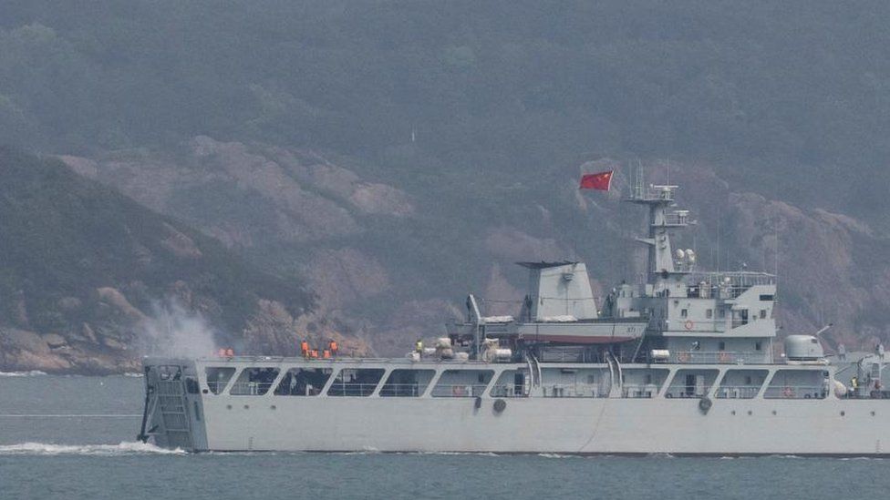 A Chinese warship fires towards the shore during a military drill near near the Taiwan-controlled Matsu Islands