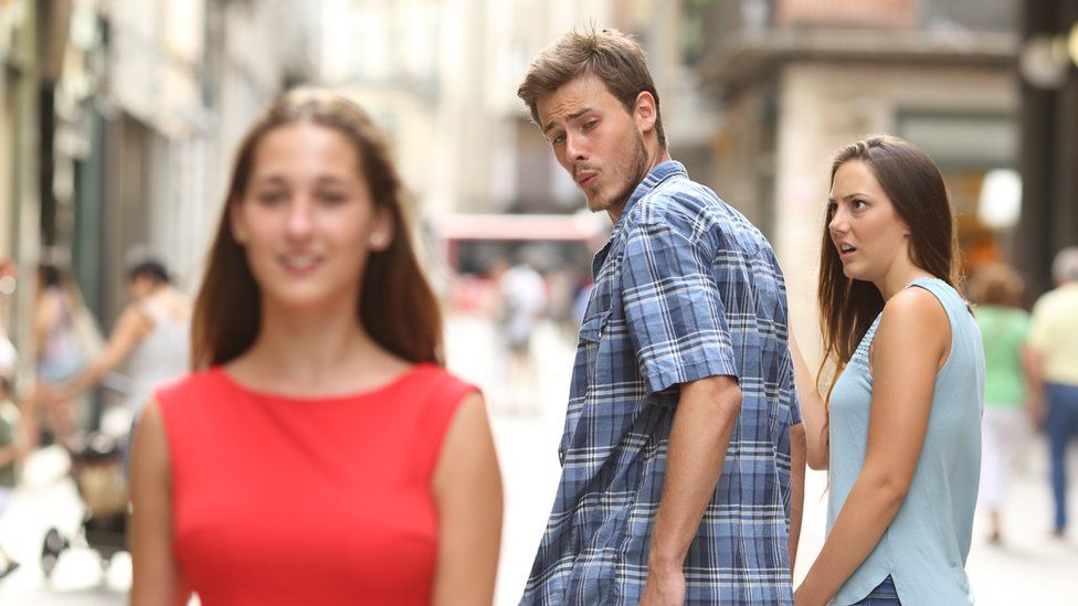 The Getty stock image which became the "distracted boyfriend" meme