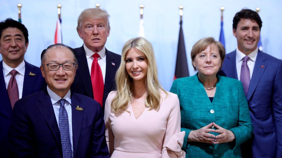 Japan's Prime Minister Shinzo Abe, World Bank President Jim Yong Kim, U.S. President Donald Trump, Ivanka Trump, German Chancellor Angela Merkel and Canada's Prime Minister Justin Trudeau pose for the family photo at the Women's Entrepreneurship Finance event during the G20 leaders summit in Hamburg, Germany July 8, 2017.