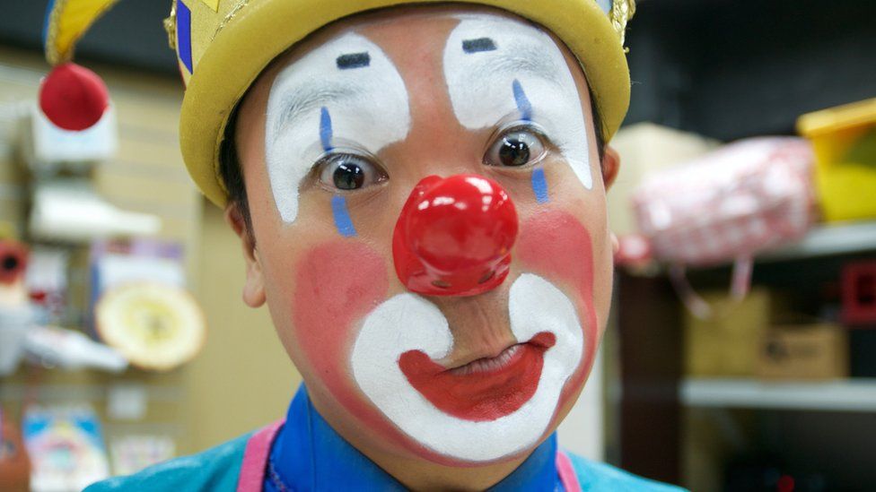 Kenneth Ng as Ken Ken, his clown alter ego